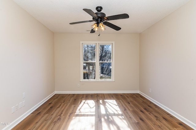 61 Fashion Pl, Durham, NC 27705 - unfurnished room with wood finished floors and ceiling fan