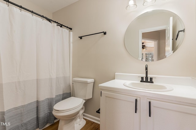 61 Fashion Pl, Durham, NC 27705 - bathroom with a ceiling fan, vanity, wood finished floors, and curtained shower