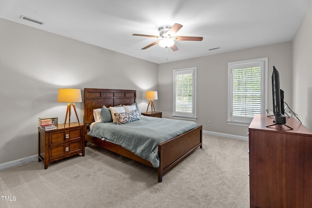 10721 Marabou Ct, Raleigh, NC 27614 - bedroom with light colored carpet and a ceiling fan