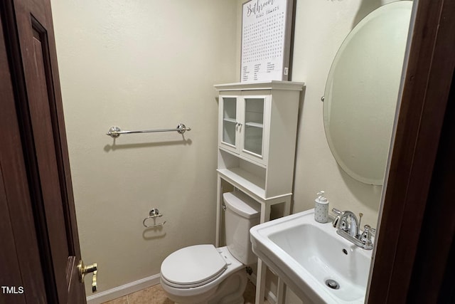 609 Sloan Dr, Cary, NC 27511 - bathroom with a sink and tile patterned flooring