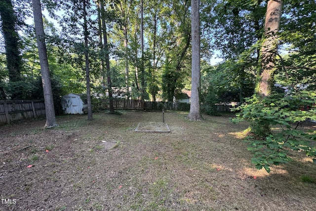 609 Sloan Dr, Cary, NC 27511 - fenced backyard with a storage shed