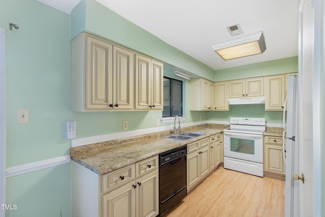 4305 Lake Ridge Dr, Raleigh, NC 27604 - kitchen featuring white appliances, under cabinet range hood, cream cabinets, and light wood-style floors