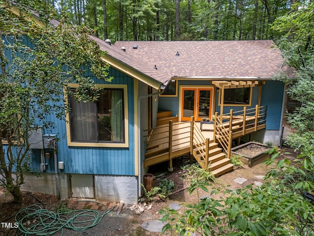 9709 Greenfield Rd, Chapel Hill, NC 27516 - back of property featuring roof with shingles and stairs