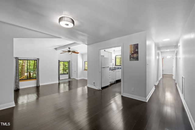 9709 Greenfield Rd, Chapel Hill, NC 27516 - unfurnished living room featuring ceiling fan, dark wood-style floors, and lofted ceiling