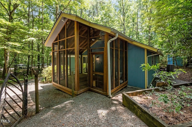 9709 Greenfield Rd, Chapel Hill, NC 27516 - view of outbuilding featuring a sunroom