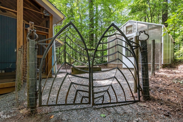 9709 Greenfield Rd, Chapel Hill, NC 27516 - gate featuring view of scattered trees