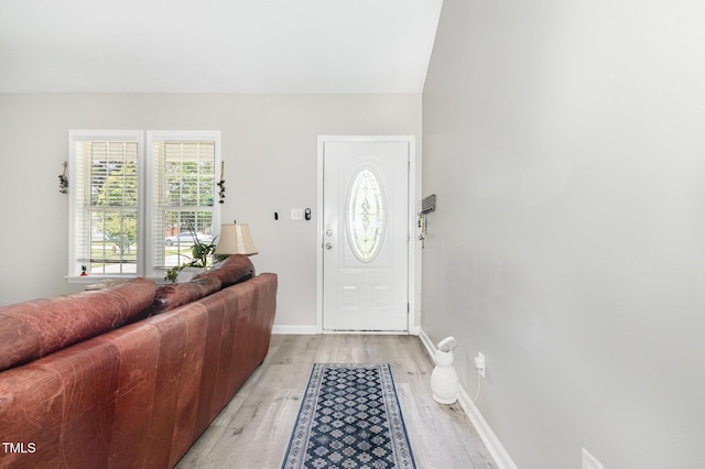 11 Sherman Rd, Fuquay Varina, NC 27526 - foyer entrance featuring light wood-type flooring, plenty of natural light, and lofted ceiling