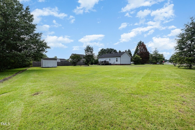 11 Sherman Rd, Fuquay Varina, NC 27526 - view of green lawn with a storage shed