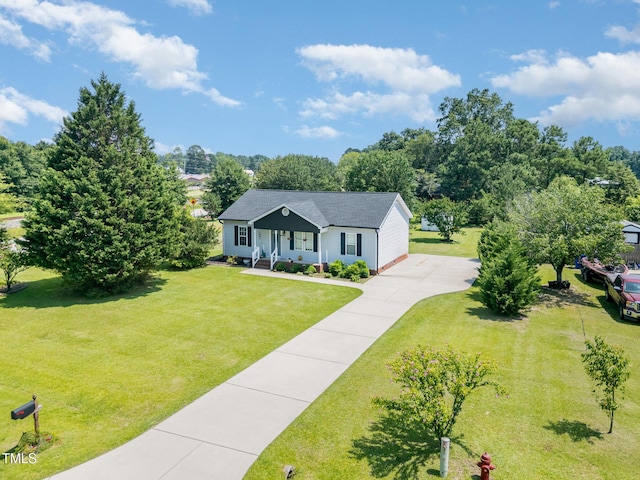 11 Sherman Rd, Fuquay Varina, NC 27526 - ranch-style house with a porch, a front yard, and concrete driveway