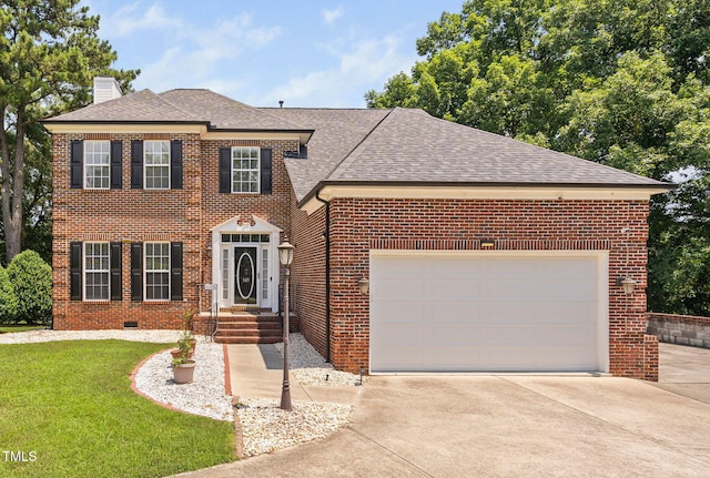 5125 Pinehall Wynd, Raleigh, NC 27604 - view of front facade featuring a chimney, brick siding, concrete driveway, roof with shingles, and a garage