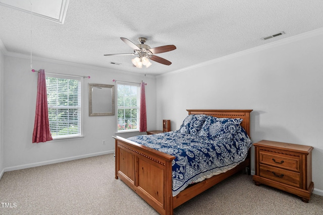 5125 Pinehall Wynd, Raleigh, NC 27604 - bedroom with ornamental molding, light colored carpet, attic access, a textured ceiling, and ceiling fan
