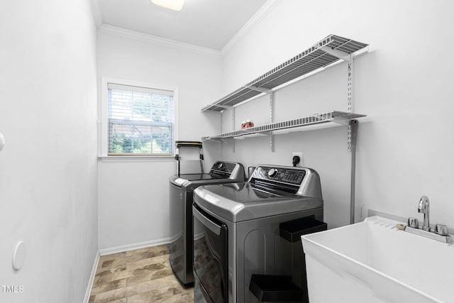 5125 Pinehall Wynd, Raleigh, NC 27604 - laundry room featuring independent washer and dryer and crown molding