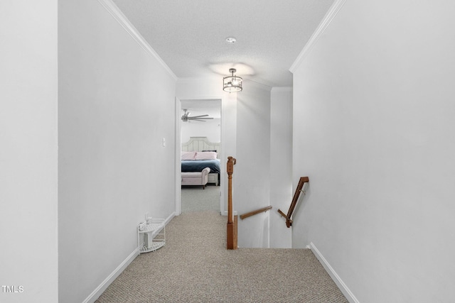 5125 Pinehall Wynd, Raleigh, NC 27604 - hallway with ornamental molding, an upstairs landing, and carpet floors