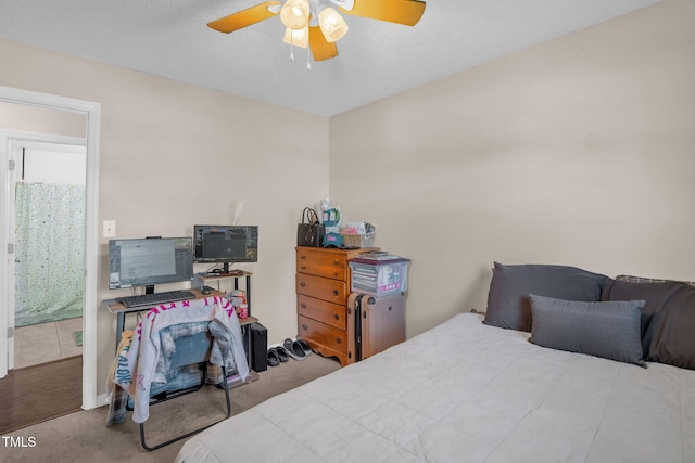 117 James Dr, Pine Level, NC 27568 - carpeted bedroom featuring a ceiling fan and connected bathroom