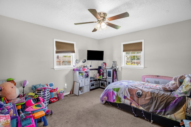 117 James Dr, Pine Level, NC 27568 - carpeted bedroom featuring ceiling fan and a textured ceiling