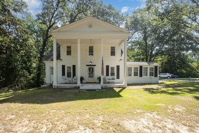 900 Beaman St, Clinton, NC 28328 - view of front of property featuring a porch and a front yard