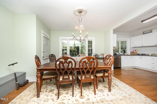 900 Beaman St, Clinton, NC 28328 - dining space with a chandelier and wood finished floors