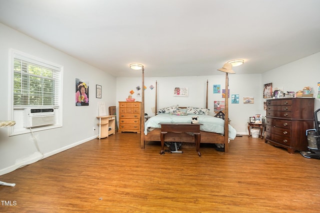 900 Beaman St, Clinton, NC 28328 - bedroom featuring light wood finished floors and cooling unit