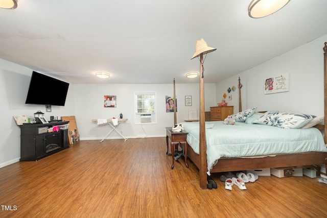 900 Beaman St, Clinton, NC 28328 - bedroom with wood finished floors and baseboards