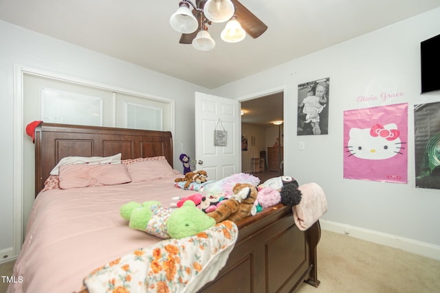 900 Beaman St, Clinton, NC 28328 - bedroom featuring light colored carpet and a ceiling fan