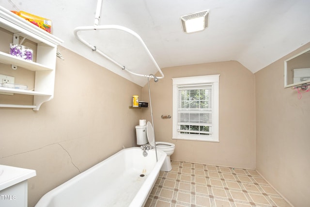 900 Beaman St, Clinton, NC 28328 - bathroom with vaulted ceiling, vanity, and tile patterned floors