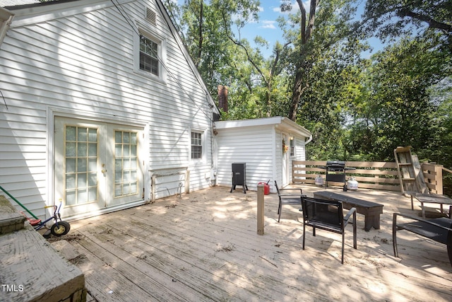 900 Beaman St, Clinton, NC 28328 - wooden deck featuring an outdoor living space, view of scattered trees, and area for grilling