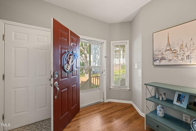 8221 Hempshire Pl Unit 101, Raleigh, NC 27613 - foyer featuring wood finished floors and baseboards