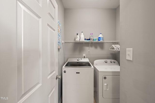 8221 Hempshire Pl Unit 101, Raleigh, NC 27613 - laundry room featuring washer and clothes dryer