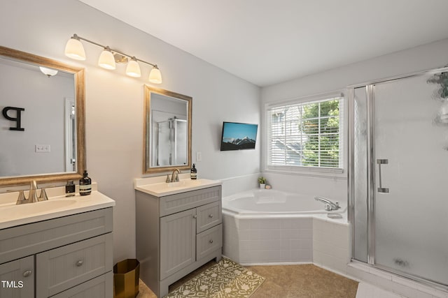 8221 Hempshire Pl Unit 101, Raleigh, NC 27613 - full bath featuring a shower stall, two vanities, and a garden tub