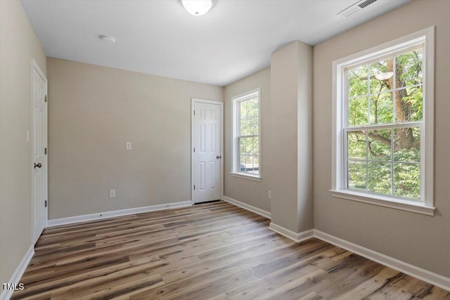 1611 Poole Rd, Raleigh, NC 27610 - empty room featuring wood finished floors