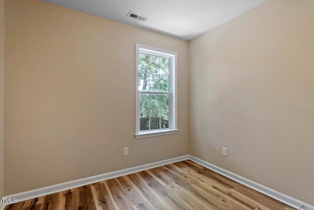 1611 Poole Rd, Raleigh, NC 27610 - unfurnished room with baseboards and light wood finished floors
