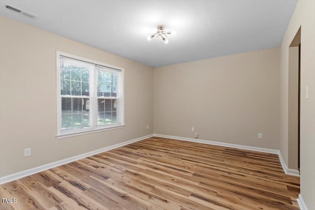1611 Poole Rd, Raleigh, NC 27610 - unfurnished room featuring light wood-type flooring and baseboards