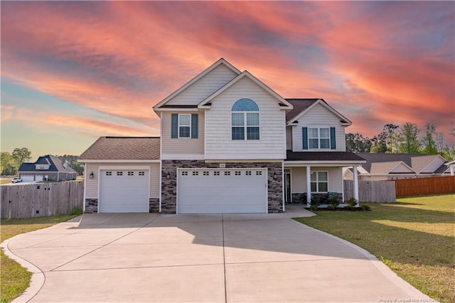 688 Townsend Rd, Raeford, NC 28376 - view of front of house with stone siding, driveway, an attached garage, and a porch