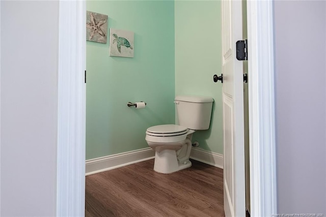 688 Townsend Rd, Raeford, NC 28376 - bathroom featuring baseboards and wood finished floors