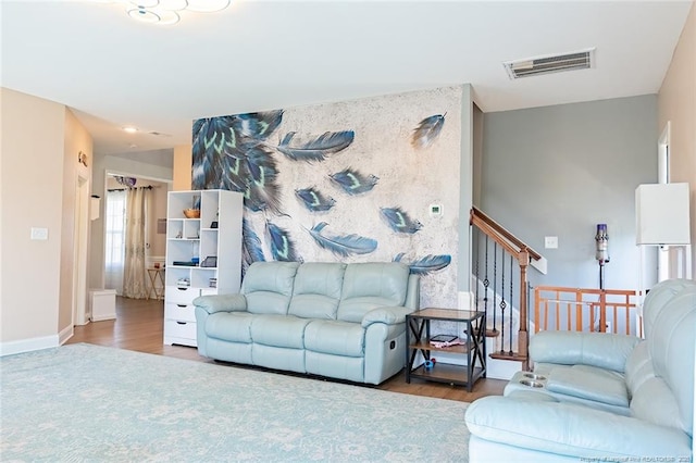 688 Townsend Rd, Raeford, NC 28376 - living room featuring wood finished floors and stairway