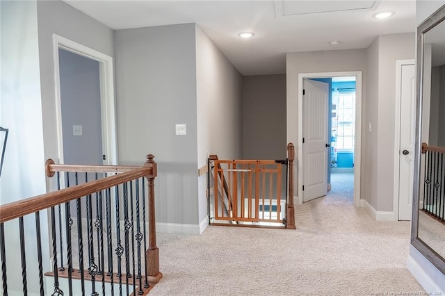 688 Townsend Rd, Raeford, NC 28376 - hall featuring an upstairs landing, carpet flooring, attic access, and recessed lighting