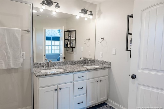 688 Townsend Rd, Raeford, NC 28376 - full bath with double vanity and baseboards