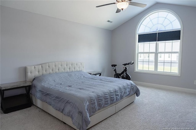 688 Townsend Rd, Raeford, NC 28376 - bedroom featuring carpet floors, multiple windows, vaulted ceiling, and a ceiling fan