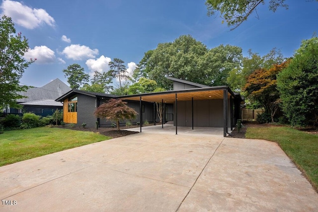 2129 Ridge Rd, Raleigh, NC 27607 - view of front facade with an attached carport and concrete driveway