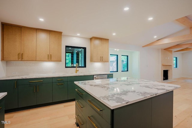 2129 Ridge Rd, Raleigh, NC 27607 - kitchen with green cabinetry, tasteful backsplash, light wood-style floors, a center island, and recessed lighting