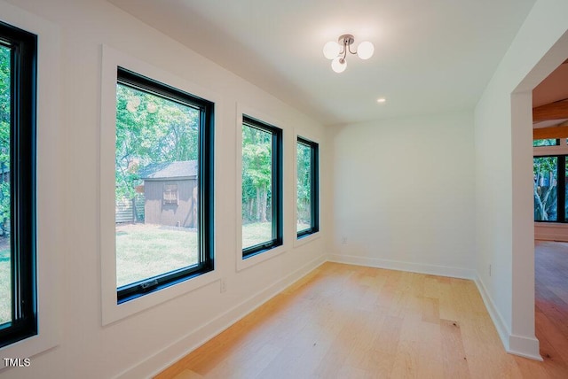 2129 Ridge Rd, Raleigh, NC 27607 - empty room with light wood-type flooring and recessed lighting