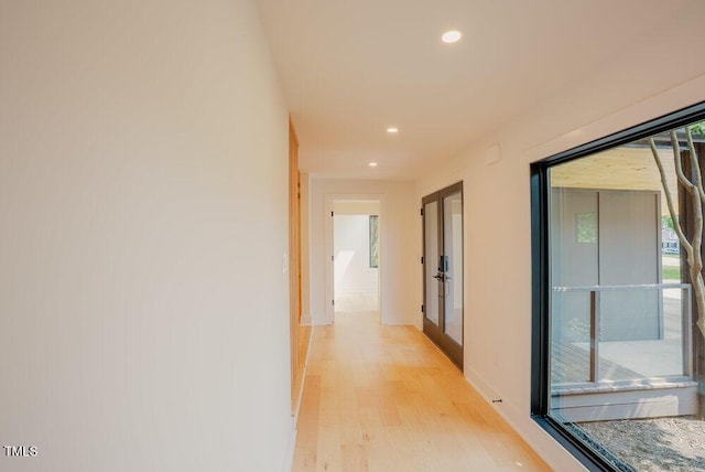 2129 Ridge Rd, Raleigh, NC 27607 - hall with light wood-type flooring, french doors, and recessed lighting