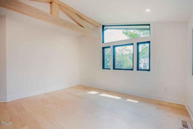 2129 Ridge Rd, Raleigh, NC 27607 - empty room featuring wood finished floors, recessed lighting, beam ceiling, and high vaulted ceiling