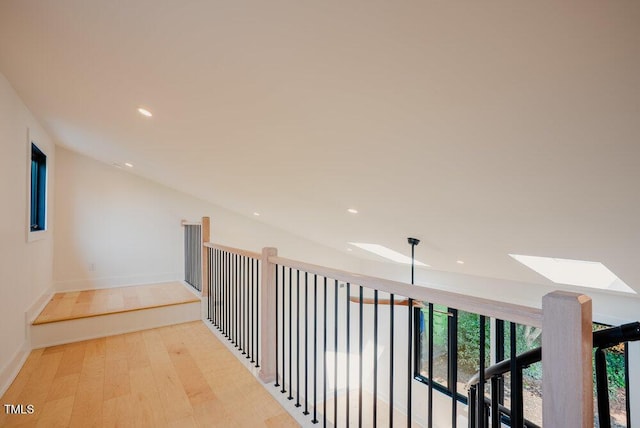 2129 Ridge Rd, Raleigh, NC 27607 - hall featuring a skylight, recessed lighting, and light wood-type flooring
