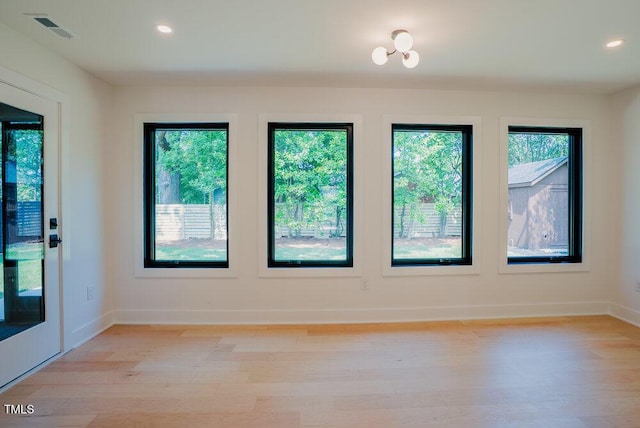 2129 Ridge Rd, Raleigh, NC 27607 - spare room featuring plenty of natural light, light wood-style flooring, and recessed lighting