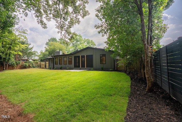 2129 Ridge Rd, Raleigh, NC 27607 - fenced backyard featuring a sunroom