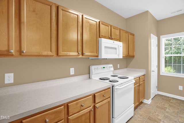 7807 Braefield Dr, Raleigh, NC 27616 - kitchen featuring white appliances and light countertops