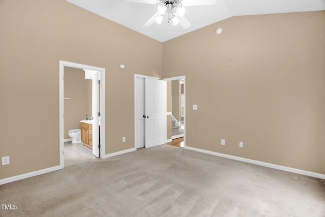 7807 Braefield Dr, Raleigh, NC 27616 - unfurnished bedroom with light carpet, high vaulted ceiling, ensuite bath, and ceiling fan