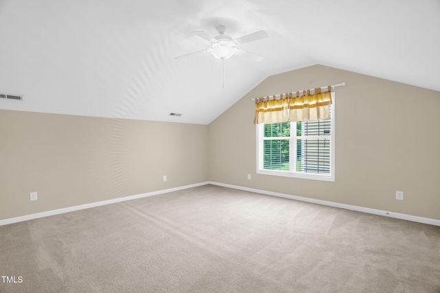 7807 Braefield Dr, Raleigh, NC 27616 - additional living space featuring carpet floors, vaulted ceiling, and a ceiling fan