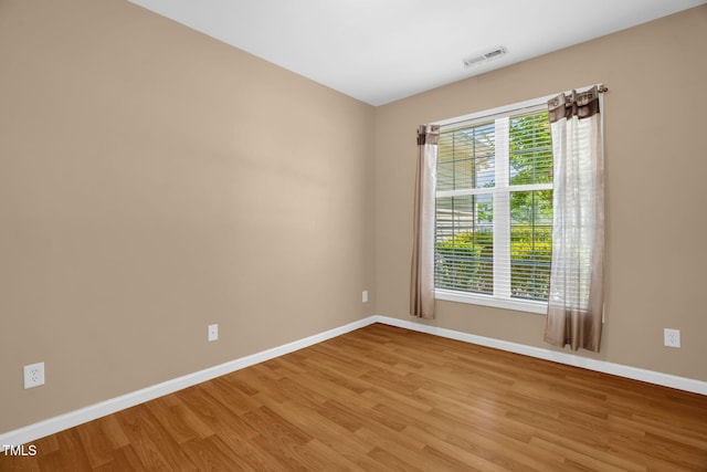 7807 Braefield Dr, Raleigh, NC 27616 - unfurnished room featuring baseboards and light wood-style floors